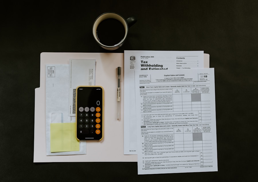 Calculator and documents suggesting financial review work